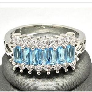 Sky Blue Topaz and White Sapphire Ring